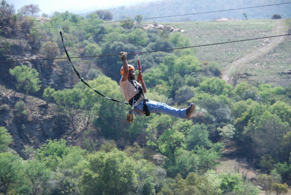 Zip line adventure tour canopy flight La Joya Lodge helicopter package
