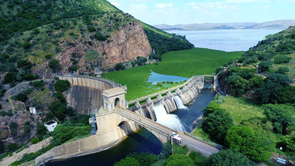 Scenic helicopter flight Hartbeespoort Dam wall and Magaliesberg mountains