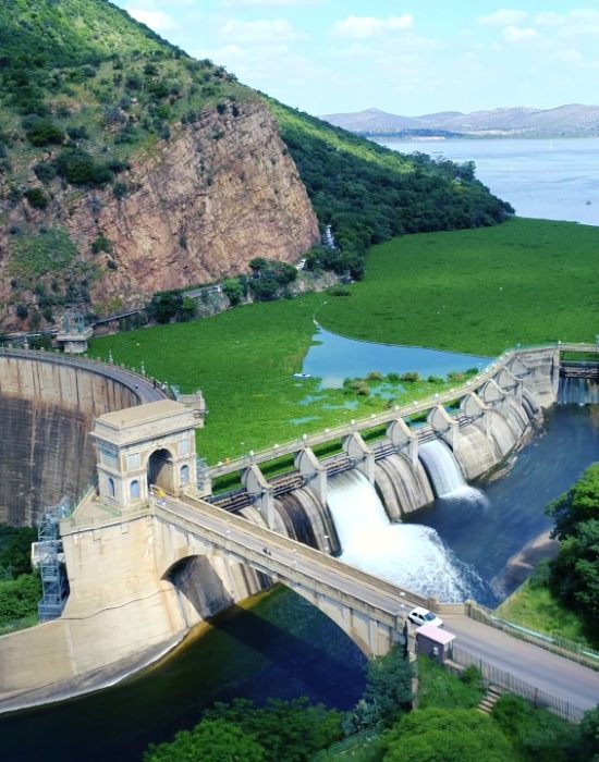 Scenic helicopter flight Hartbeespoort Dam wall and Magaliesberg mountains