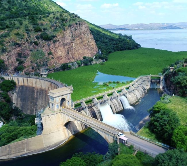 Scenic helicopter flight Hartbeespoort Dam wall and Magaliesberg mountains